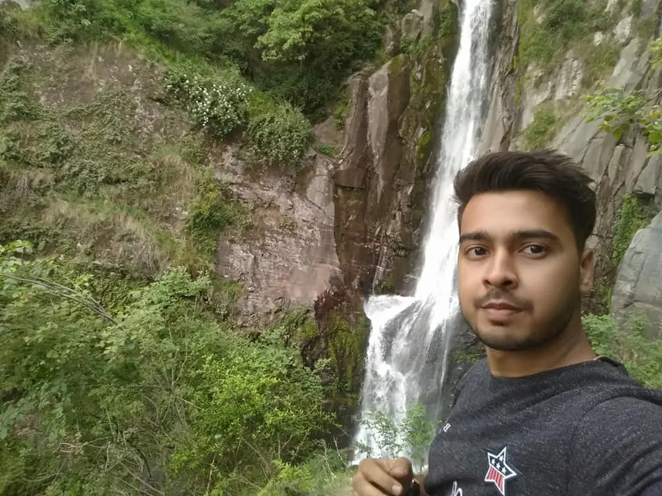 Rahul after completing a small climb near Jogini Waterfall in Manali
