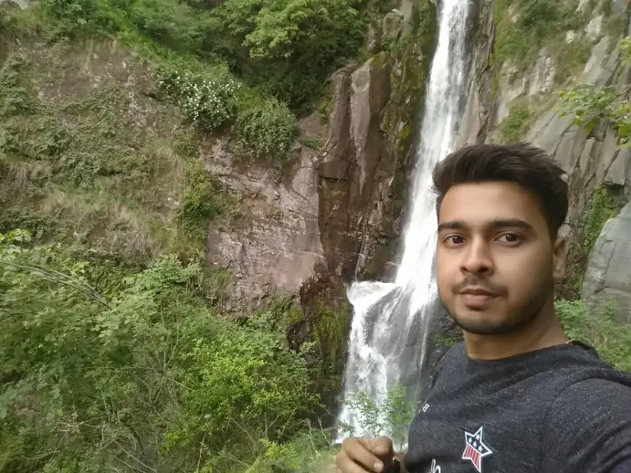 Rahul after completing a small climb near Jogini Waterfall in Manali